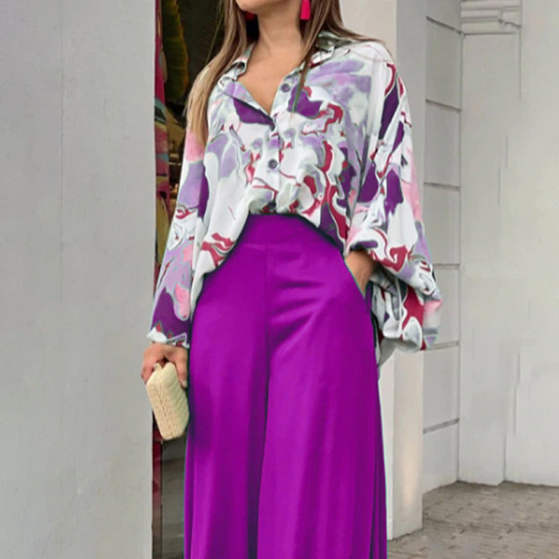 Atmungsaktive, elegante Damenbluse mit farbenfrohem Muster, weiten Ärmeln und lockerem Schnitt von berg-feldt