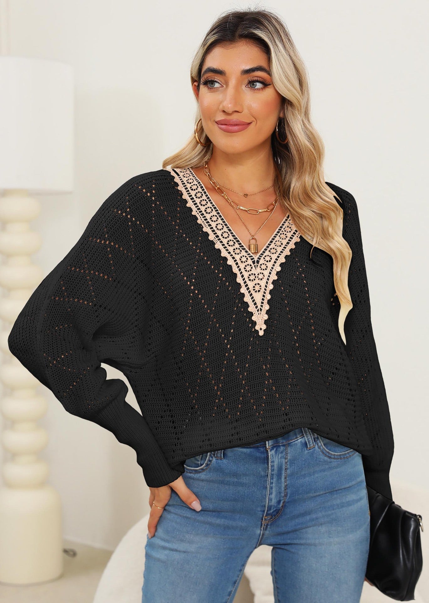 Pull en tricot ajouré à col en V Berg-Feldt pour femme