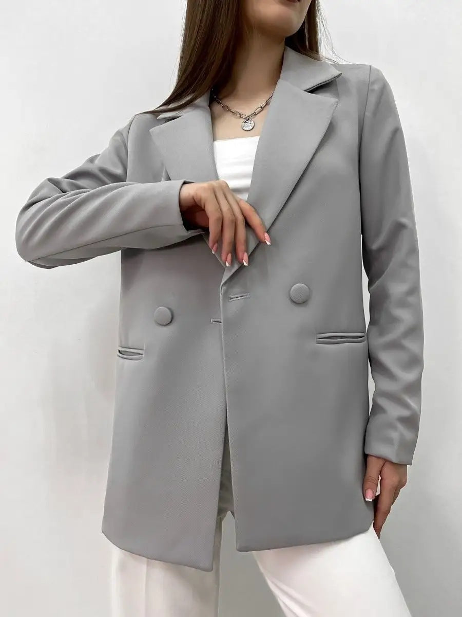 Élégant blazer pour femme à double boutonnage, avec poches et coupe décontractée de berg-feldt