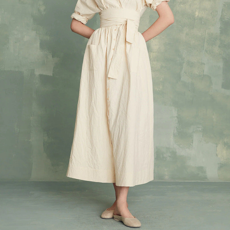 Robe portefeuille élégante pour femme avec patte de boutonnage et ceinture de berg-feldt
