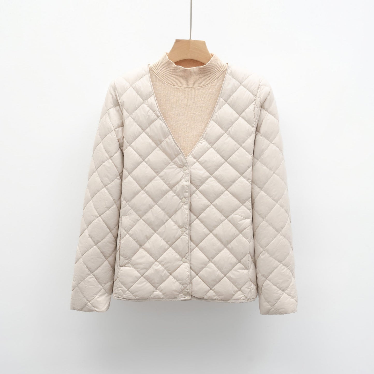 Veste matelassée de mi-saison pour femme avec col en V moderne et fermeture boutonnée Berg-Feldt