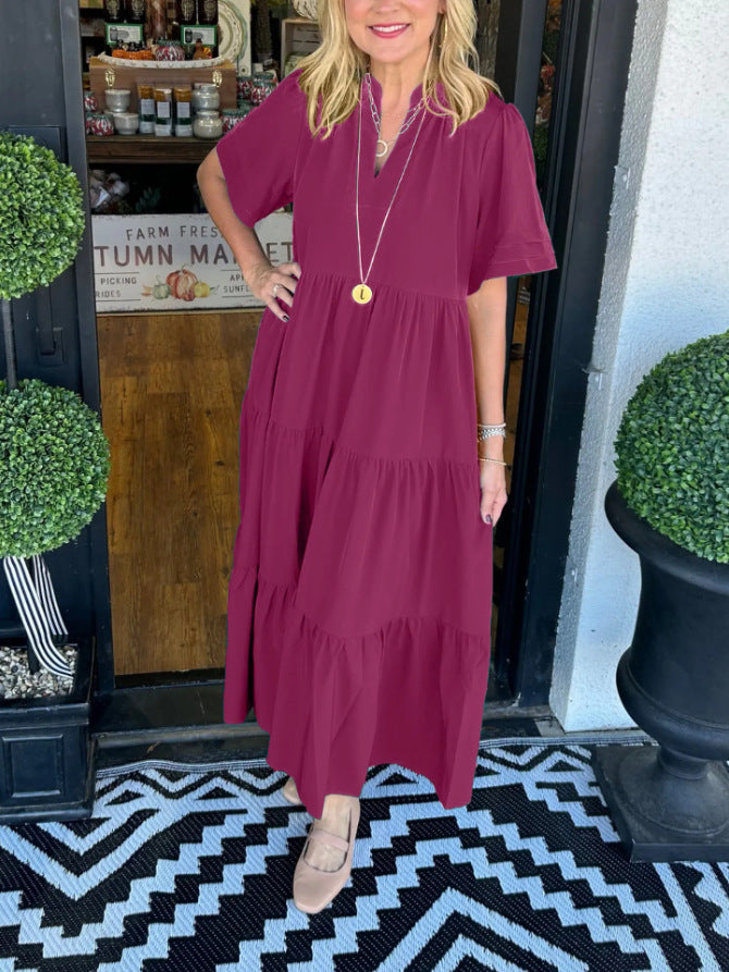 Langes Damenkleid mit Stufen-Silhouette und V-Ausschnitt von berg-feldt