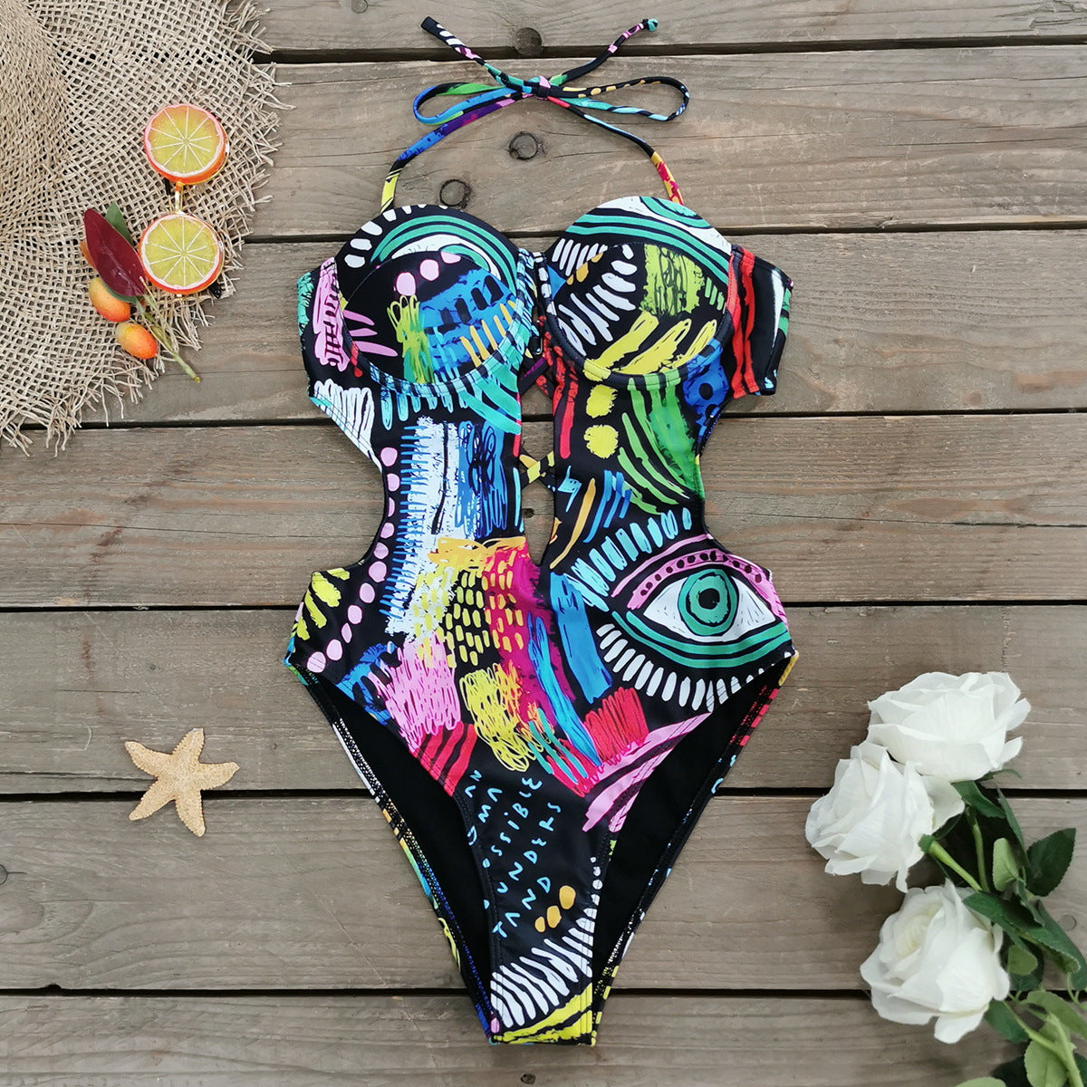 Badeanzug für Damen mit innovativem Cut-out und buntem Muster von berg-feldt