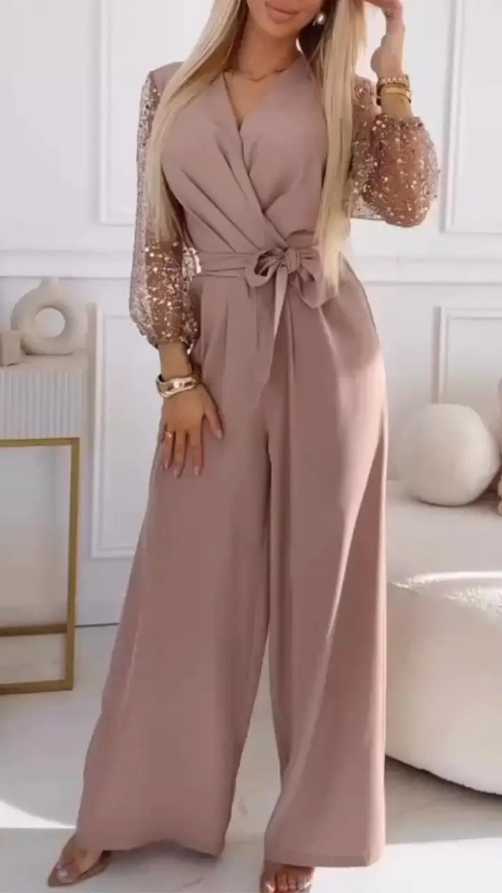 Eleganter Damen-Jumpsuit mit Wickeloptik und glitzernden Ärmeln von berg-feldt