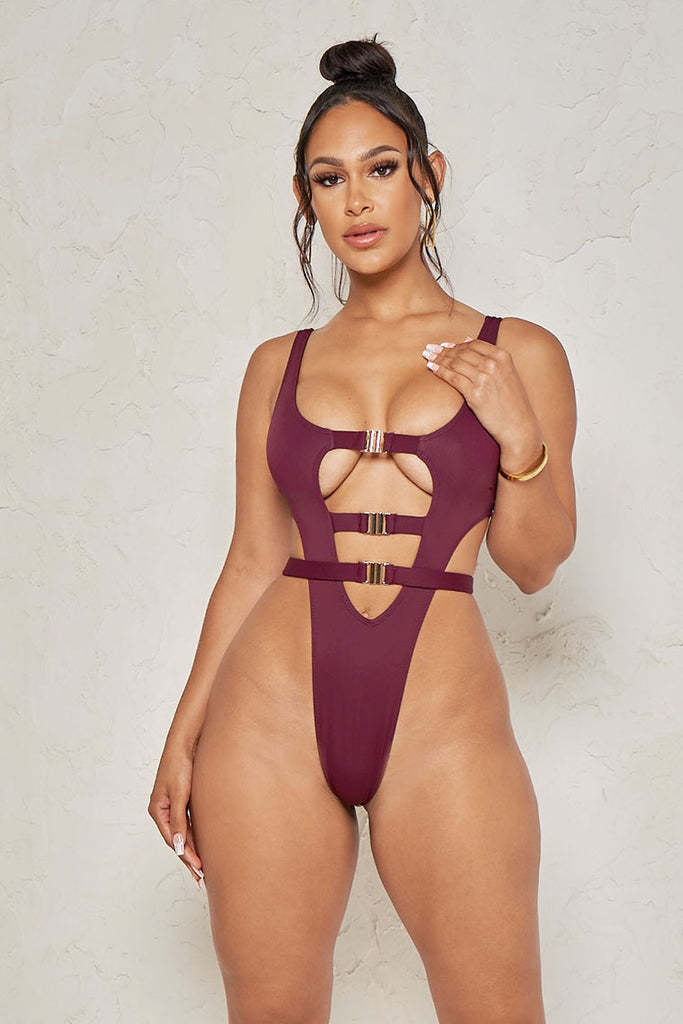Badeanzug für Damen mit Cut-out und goldenen Details von berg-feldt