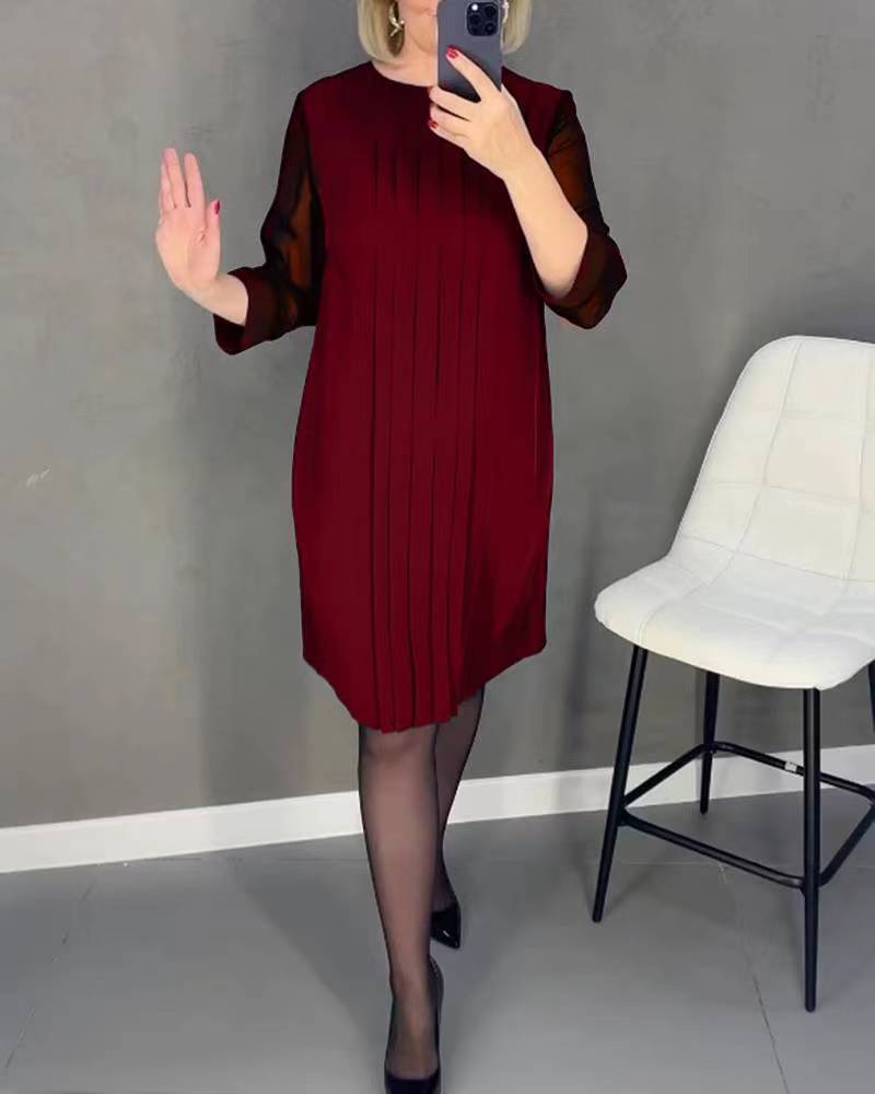 Elegant evening dress for women with pleats, transparent sleeves and a refined cut by berg-feldt