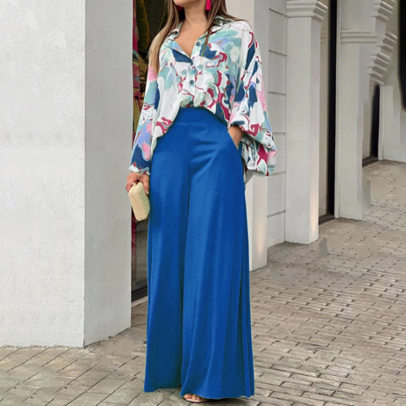 Atmungsaktive, elegante Damenbluse mit farbenfrohem Muster, weiten Ärmeln und lockerem Schnitt von berg-feldt