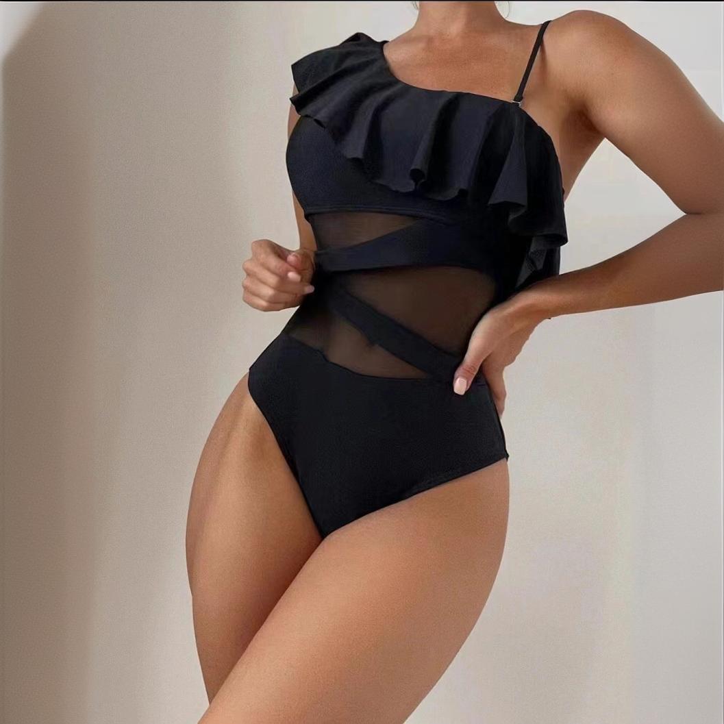 Asymmetrischer Badeanzug für Damen mit Rüschen und transparenten Details von berg-feldt