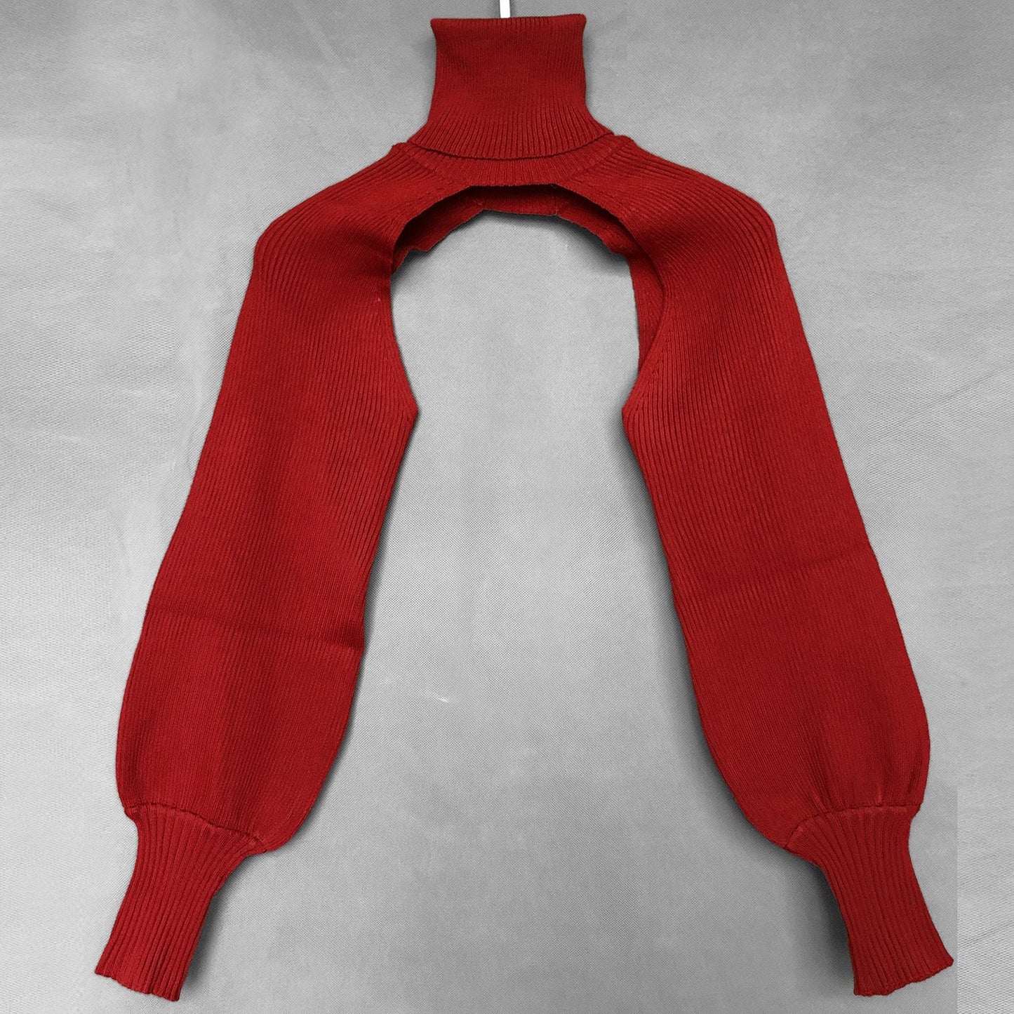Haut en tricot pour femme coupe innovante col montant Berg-Feldt