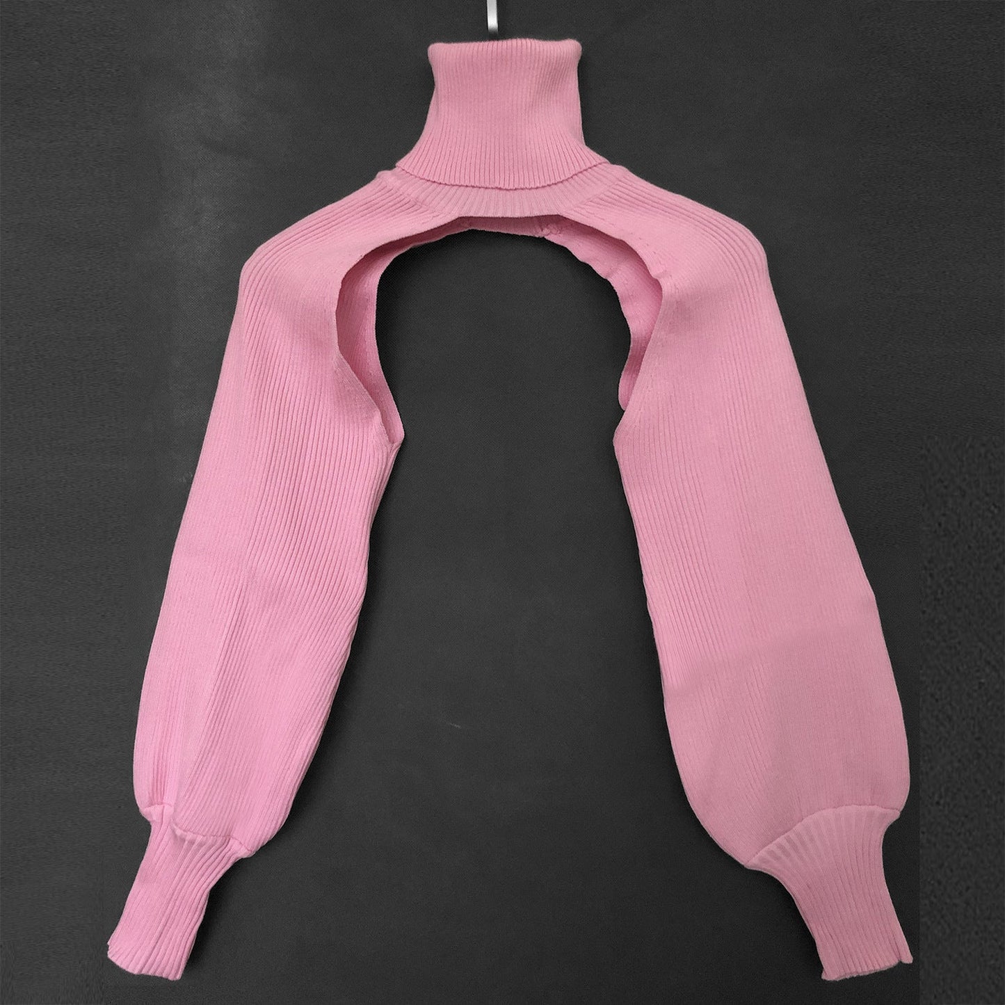 Haut en tricot pour femme coupe innovante col montant Berg-Feldt