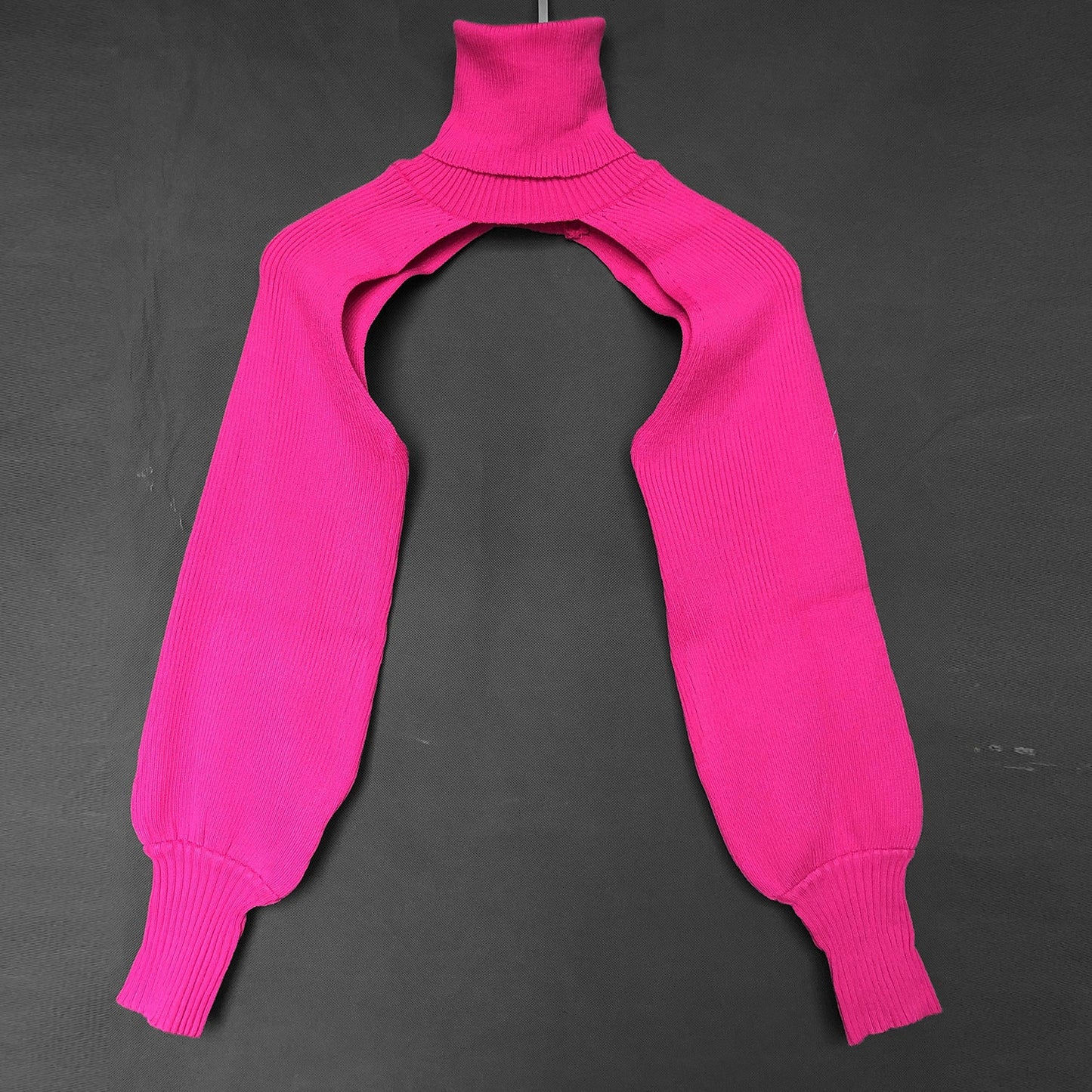 Haut en tricot pour femme coupe innovante col montant Berg-Feldt