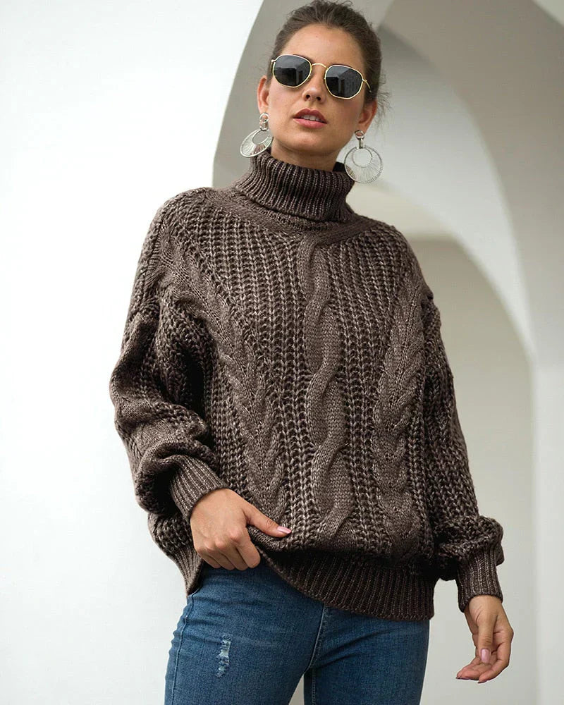 Pull roulé en maille par Elvin