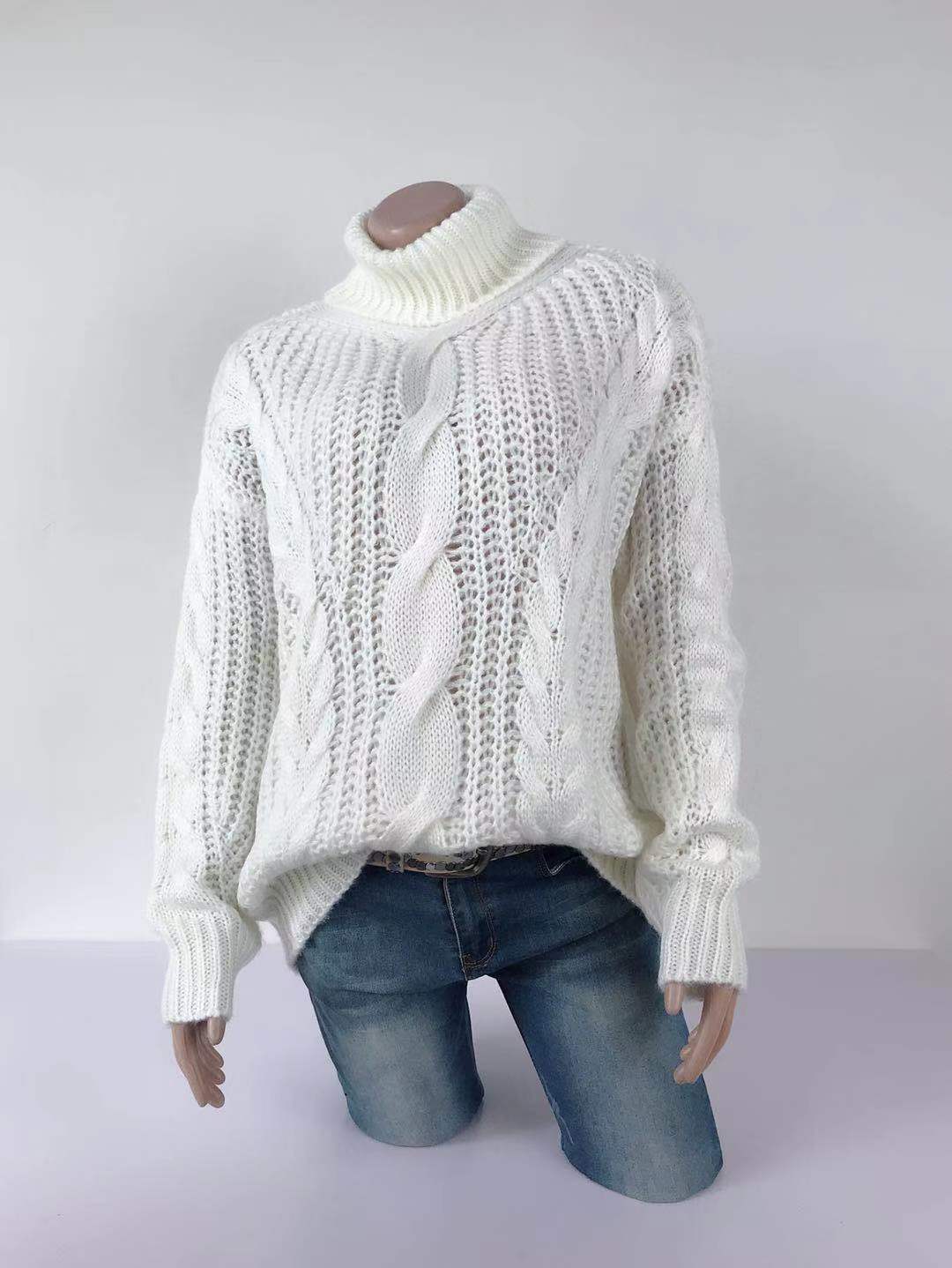 Pull roulé en maille par Elvin