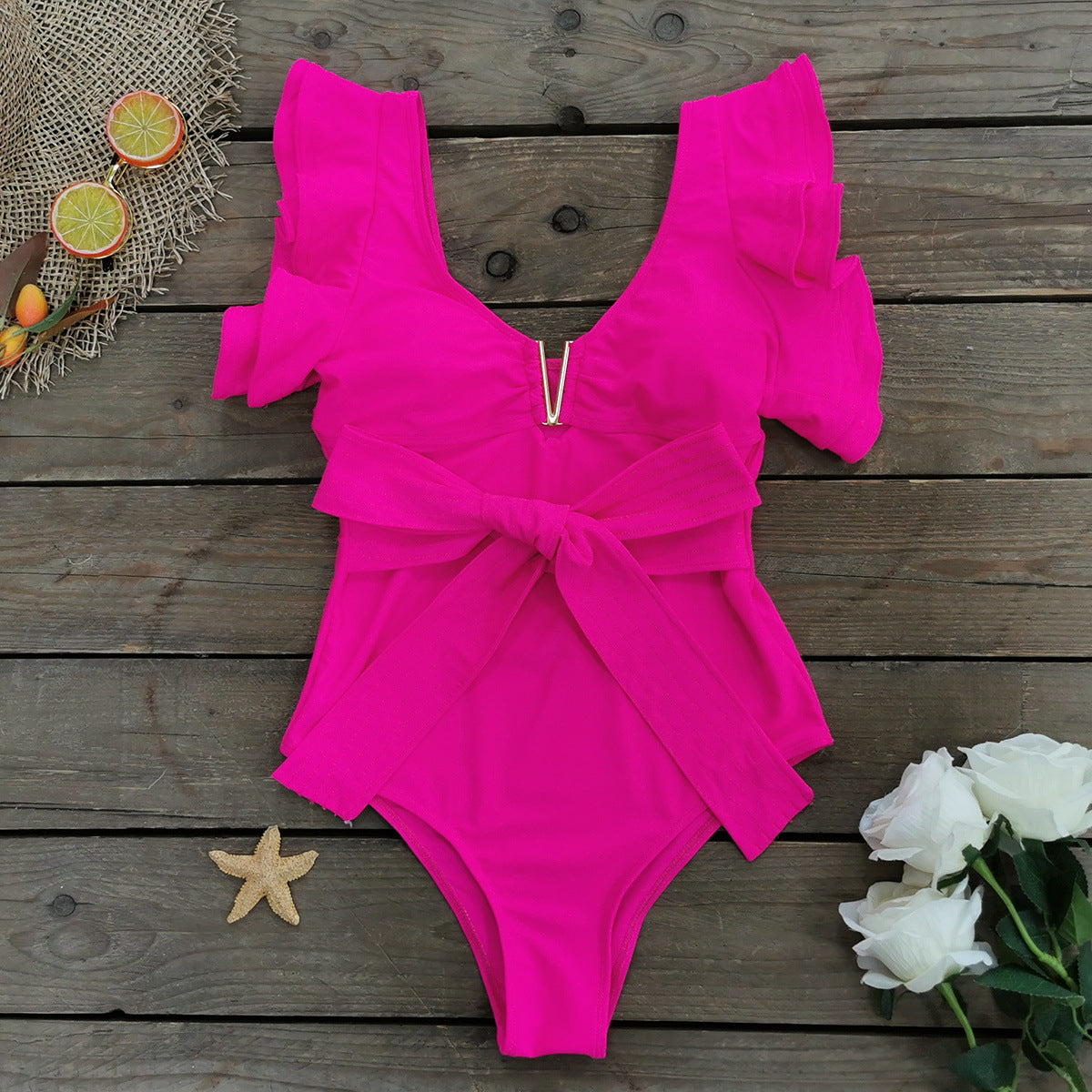 Élégant maillot de bain pour femme avec volants et ceinture, de berg-feldt