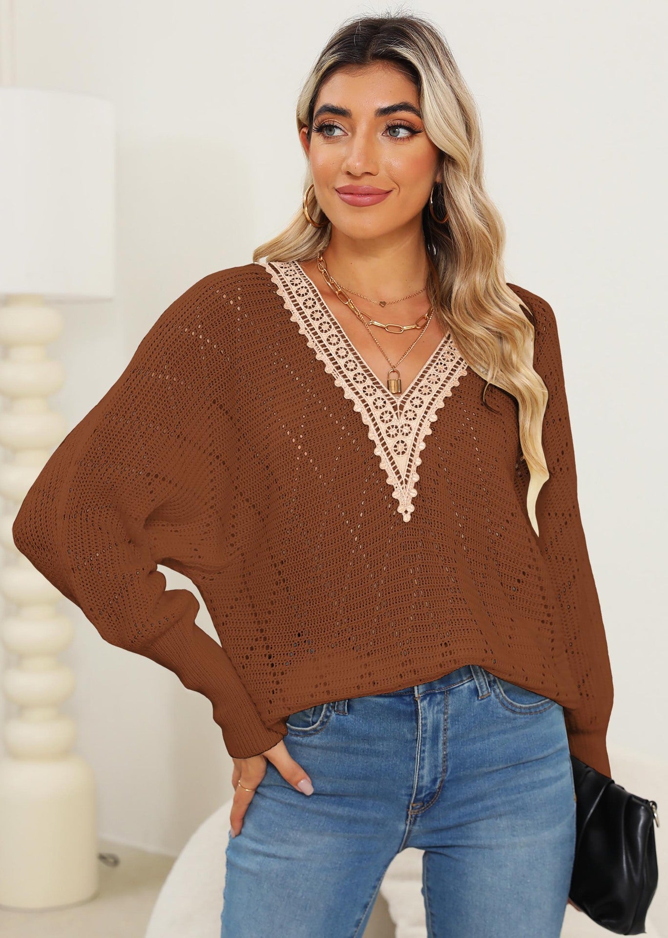 Pull en tricot ajouré à col en V Berg-Feldt pour femme