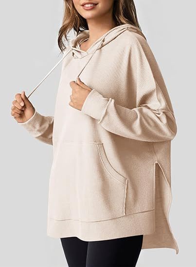 Grand sweat à capuche pour femme avec poches et matière structurée de qualité supérieure de berg-feldt
