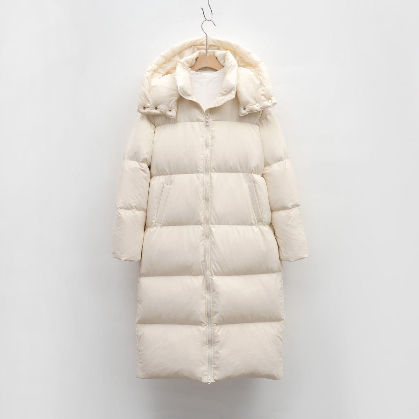Manteau de duvet long et volumineux pour femme avec capuche amovible et poches latérales Berg-Feldt
