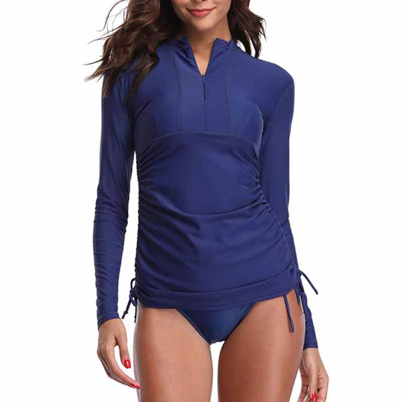 Haut de maillot de bain pour femme Berg-Feldt avec laçage innovant et manches longues