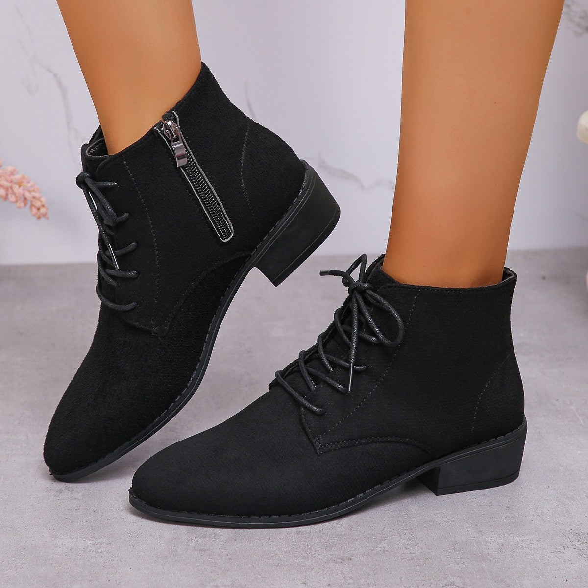 Modische Damen-Stiefeletten mit seitlichem Zipper und Textil-Obermaterial von berg-feldt