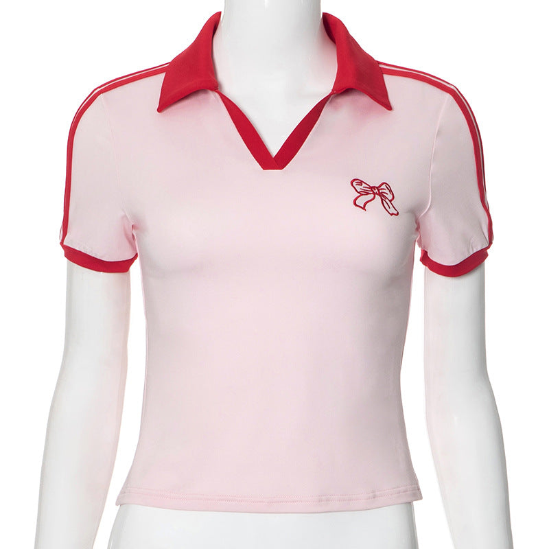Polo de sport Berg-Feldt à manches courtes avec liseré contrastant pour femme