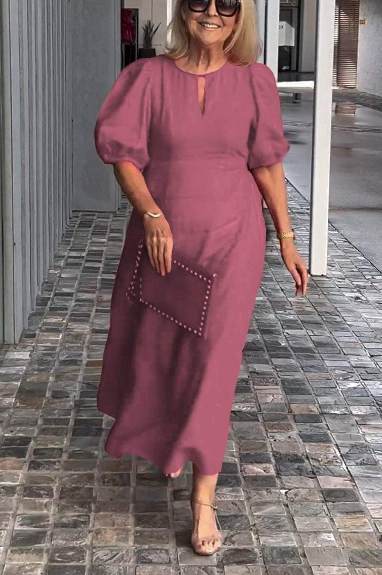 Elegantes Maxikleid für Damen mit Puffärmeln und dekorativem Saum von berg-feldt
