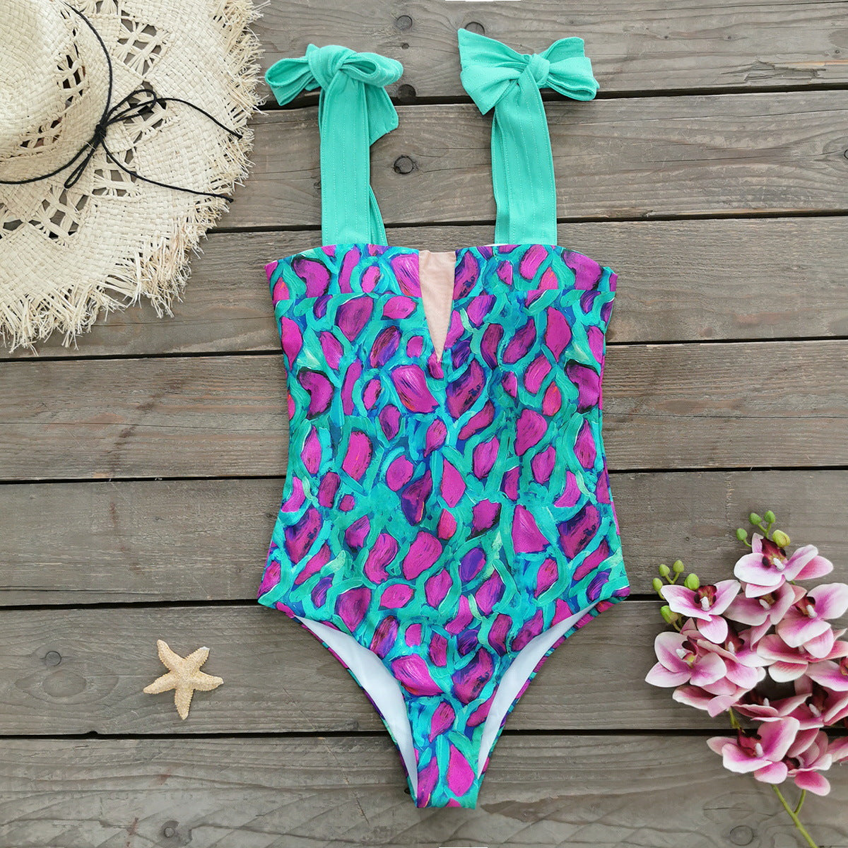 Maillot de bain femme Berg-Feldt : une pièce à nœuds romantiques et motif floral