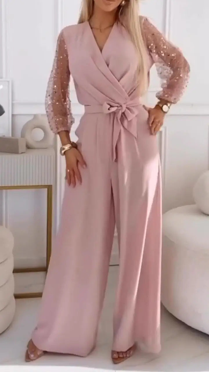Eleganter Damen-Jumpsuit mit Wickeloptik und glitzernden Ärmeln von berg-feldt
