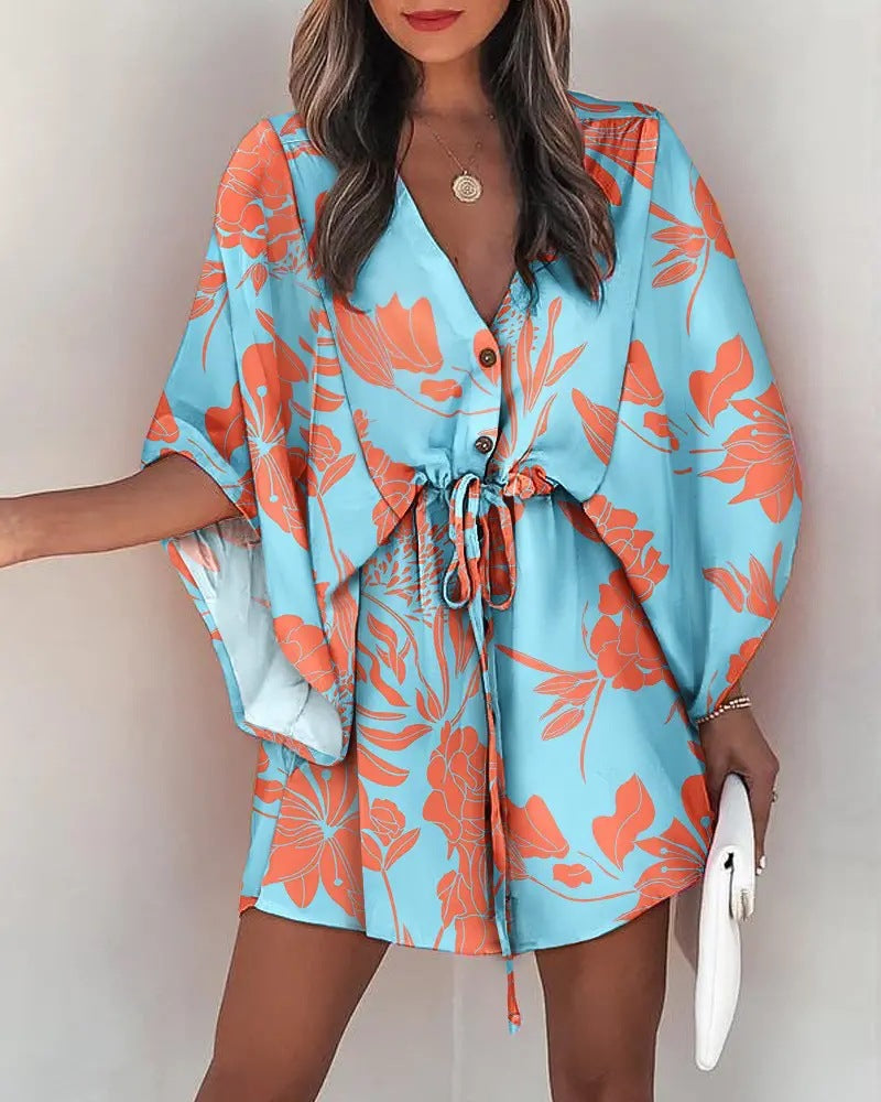 Robe pour femme Berg-Feldt : motif floral et ceinture à la taille
