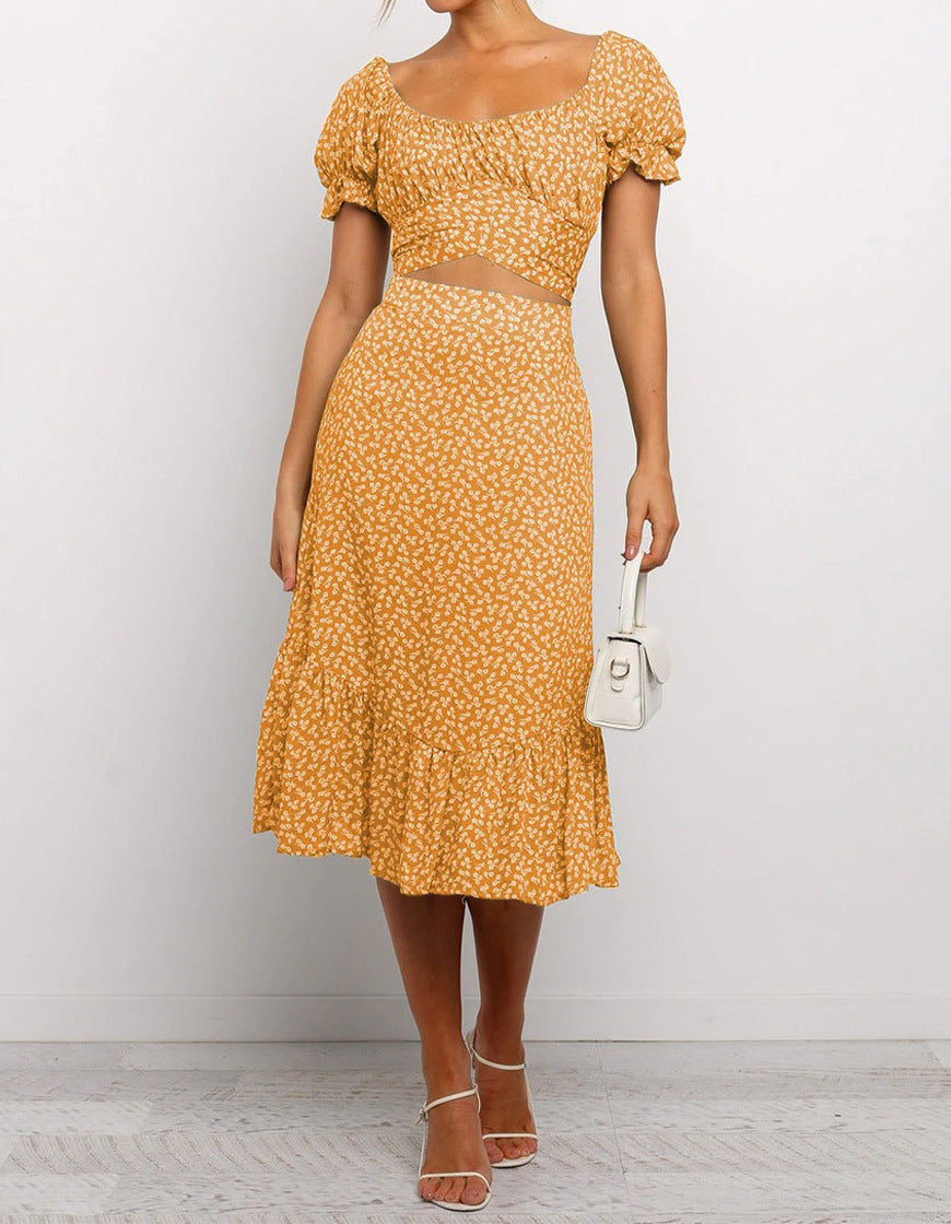 Robe mi-longue pour femme à manches bouffantes et découpes par berg-feldt