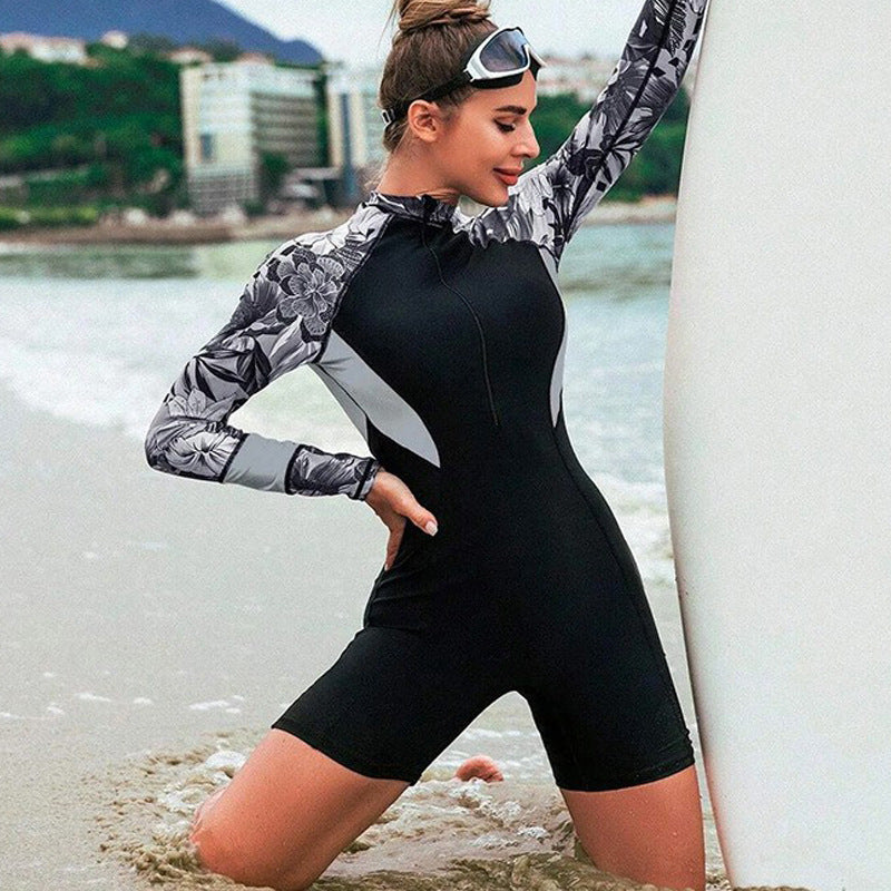 Combinaison de surf femme Berg-Feldt à motif floral, manches longues et col montant zippé