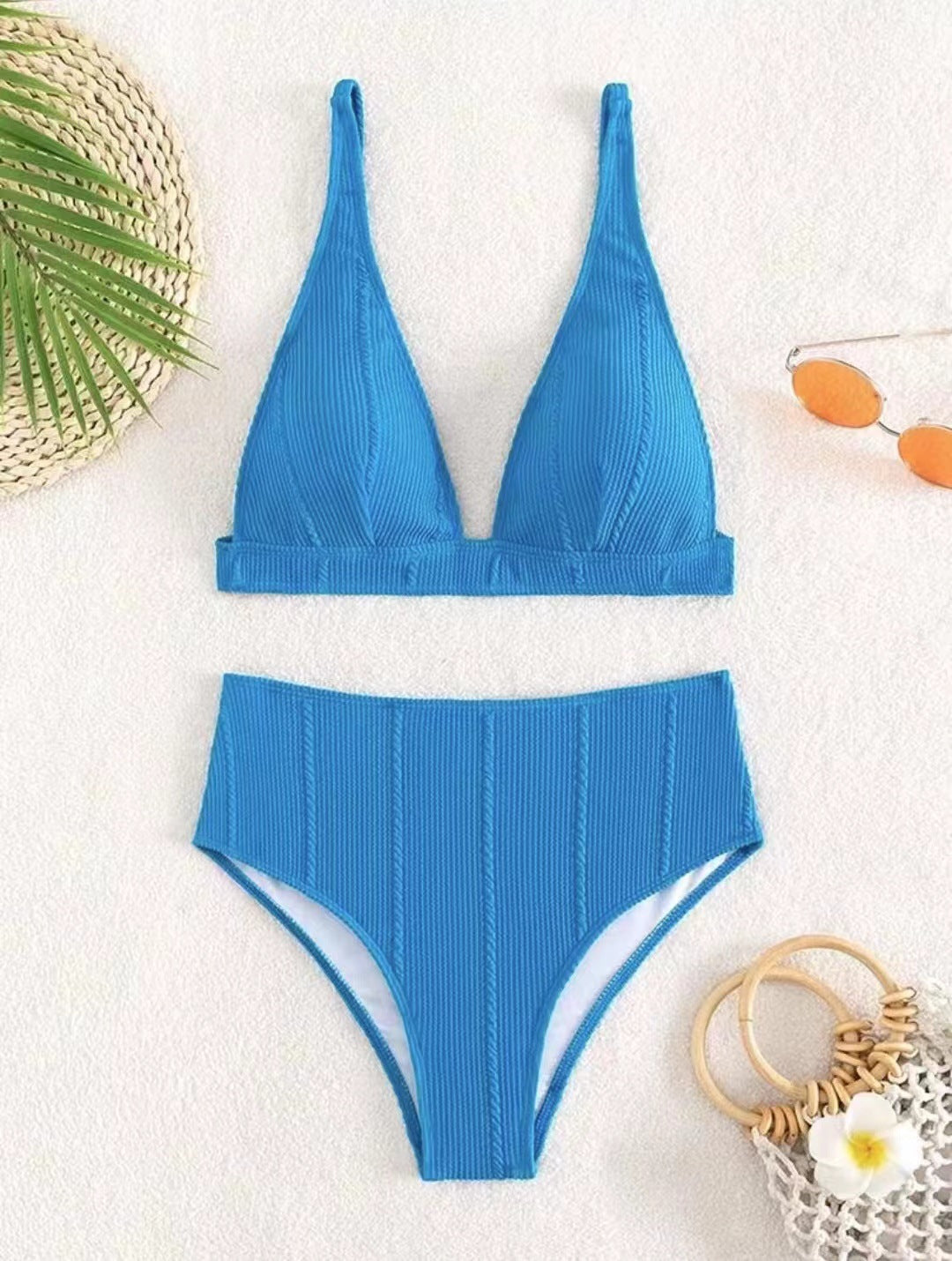 Haut de maillot de bain femme Berg-Feldt à coupe haute, avec surface texturée et fines bretelles