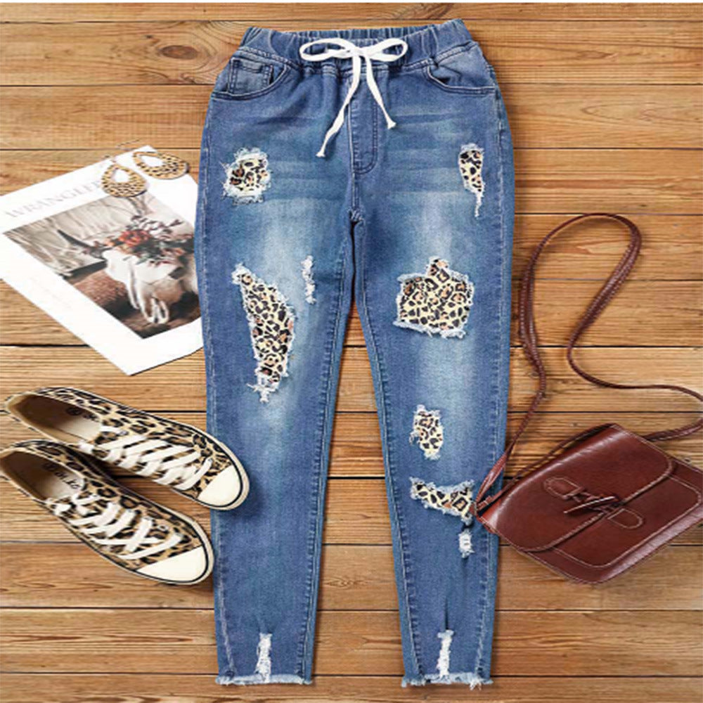 Joggers en jean délavé à imprimé léopard Berg-Feldt pour femme