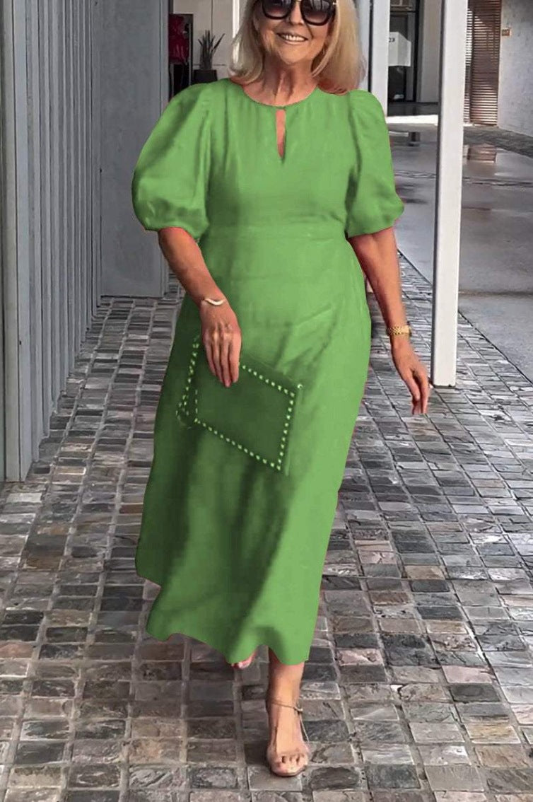 Elegantes Maxikleid für Damen mit Puffärmeln und dekorativem Saum von berg-feldt
