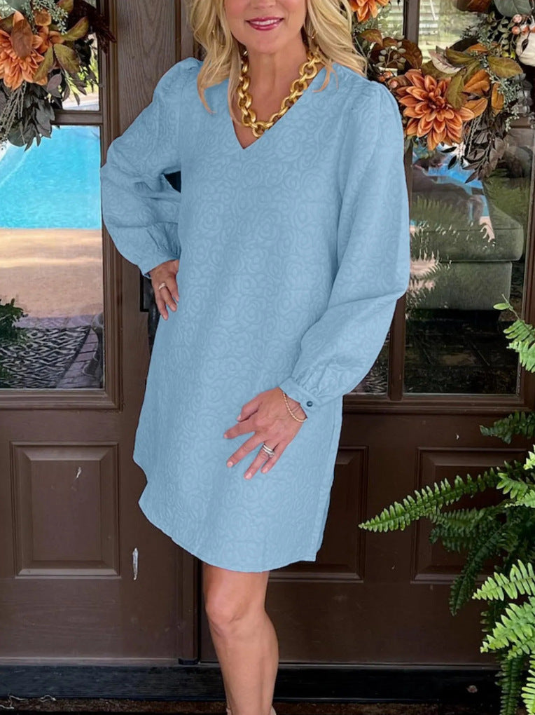 Elegantes Damenkleid mit V-Ausschnitt und Puffärmeln von berg-feldt