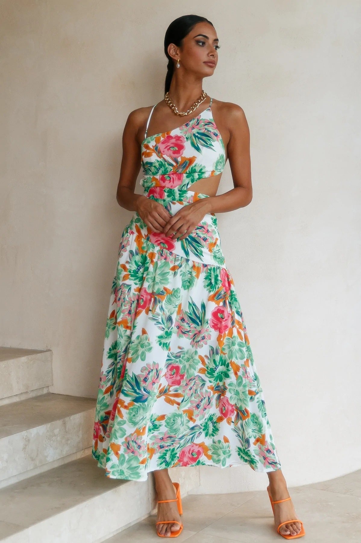 Robe longue élégante à découpes florales signée berg-feldt