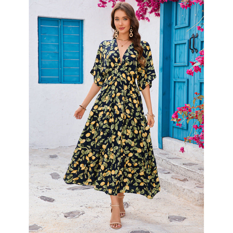 Robe longue à fleurs avec manches papillon de berg-feldt