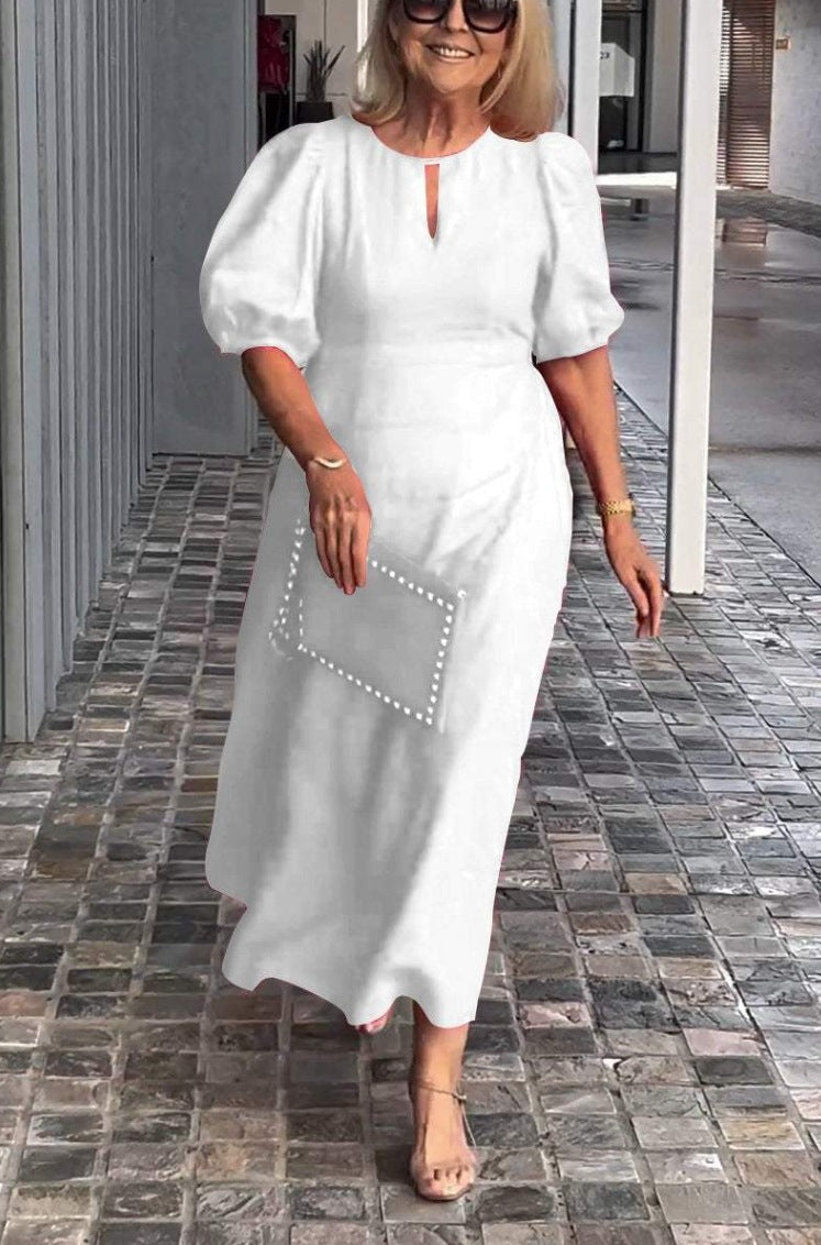 Elegantes Maxikleid für Damen mit Puffärmeln und dekorativem Saum von berg-feldt