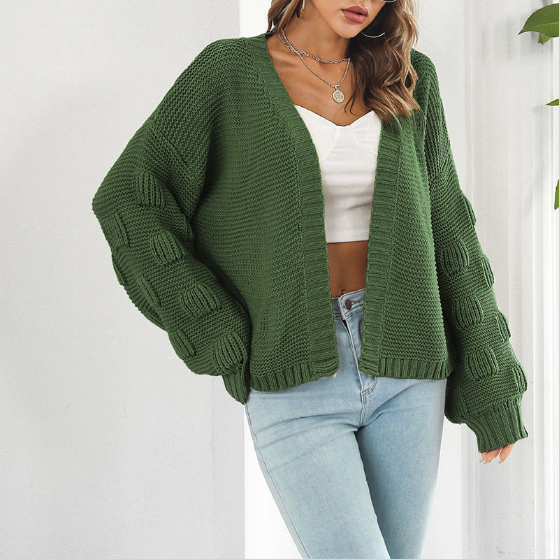 Cardigan femme en grosse maille avec manches volumineuses et design moderne Berg-Feldt