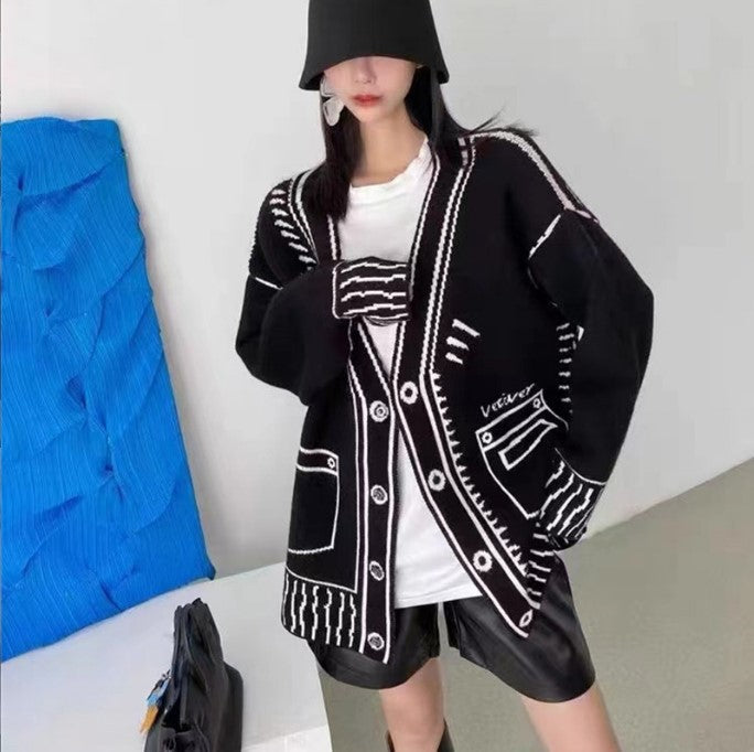 Damen Oversized Strickjacke mit kreativem Design und großen Knöpfen Berg-Feldt