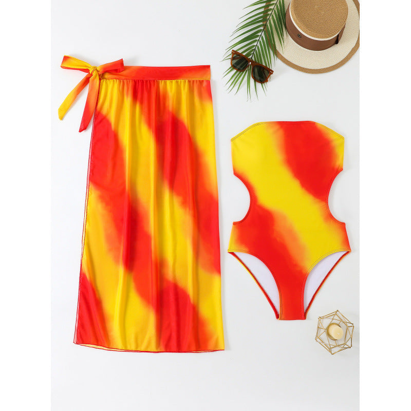 Maillot de bain femme Berg-Feldt avec découpes latérales et paréo assorti