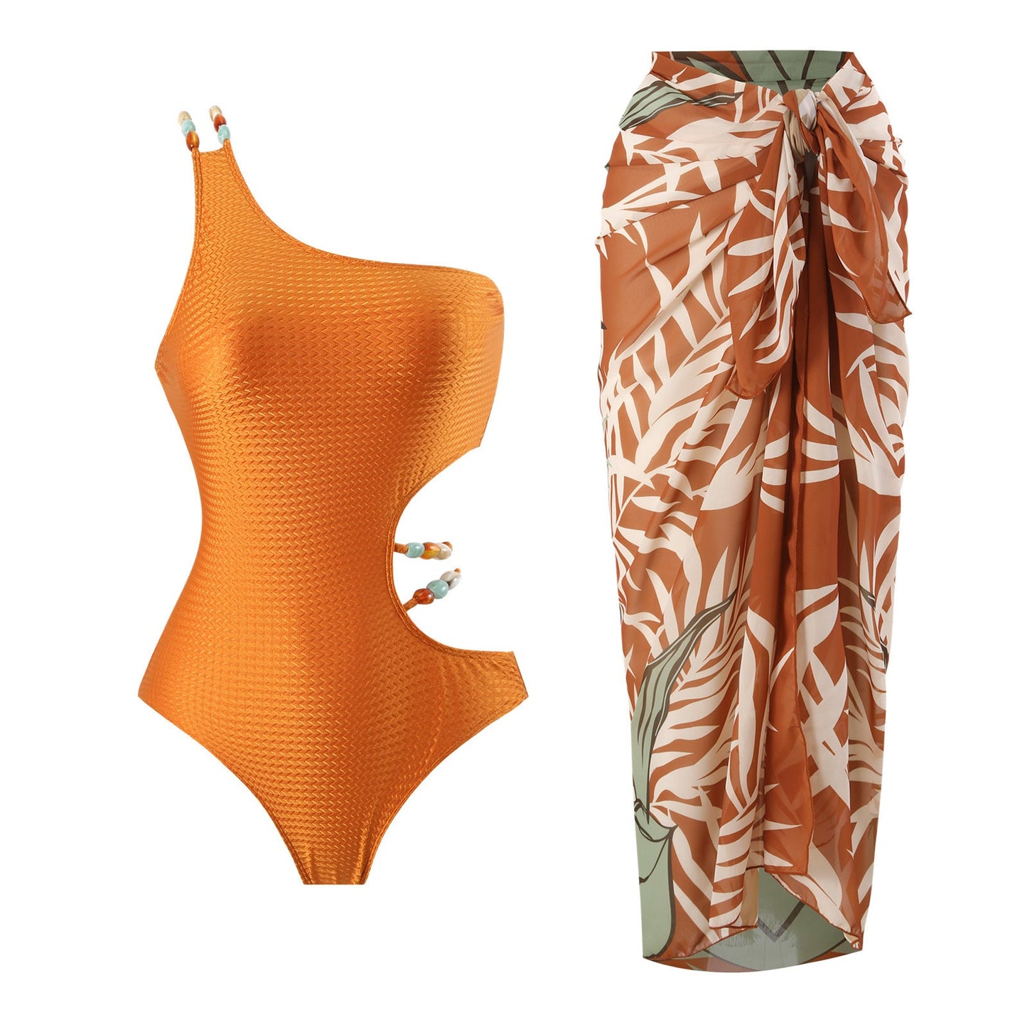 Ensemble de maillots de bain une pièce pour femme avec découpes et épaule asymétrique, avec paréo fluide, par berg-feldt