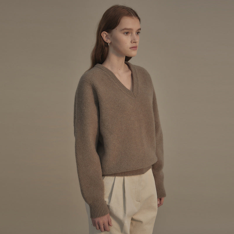 Hochwertiger Damen-Wollpullover mit V-Ausschnitt, lässigem Schnitt und Bündchen von berg-feldt
