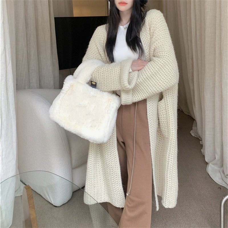 Cardigan long femme avec poches pratiques et motif tressé tendance Berg-Feldt