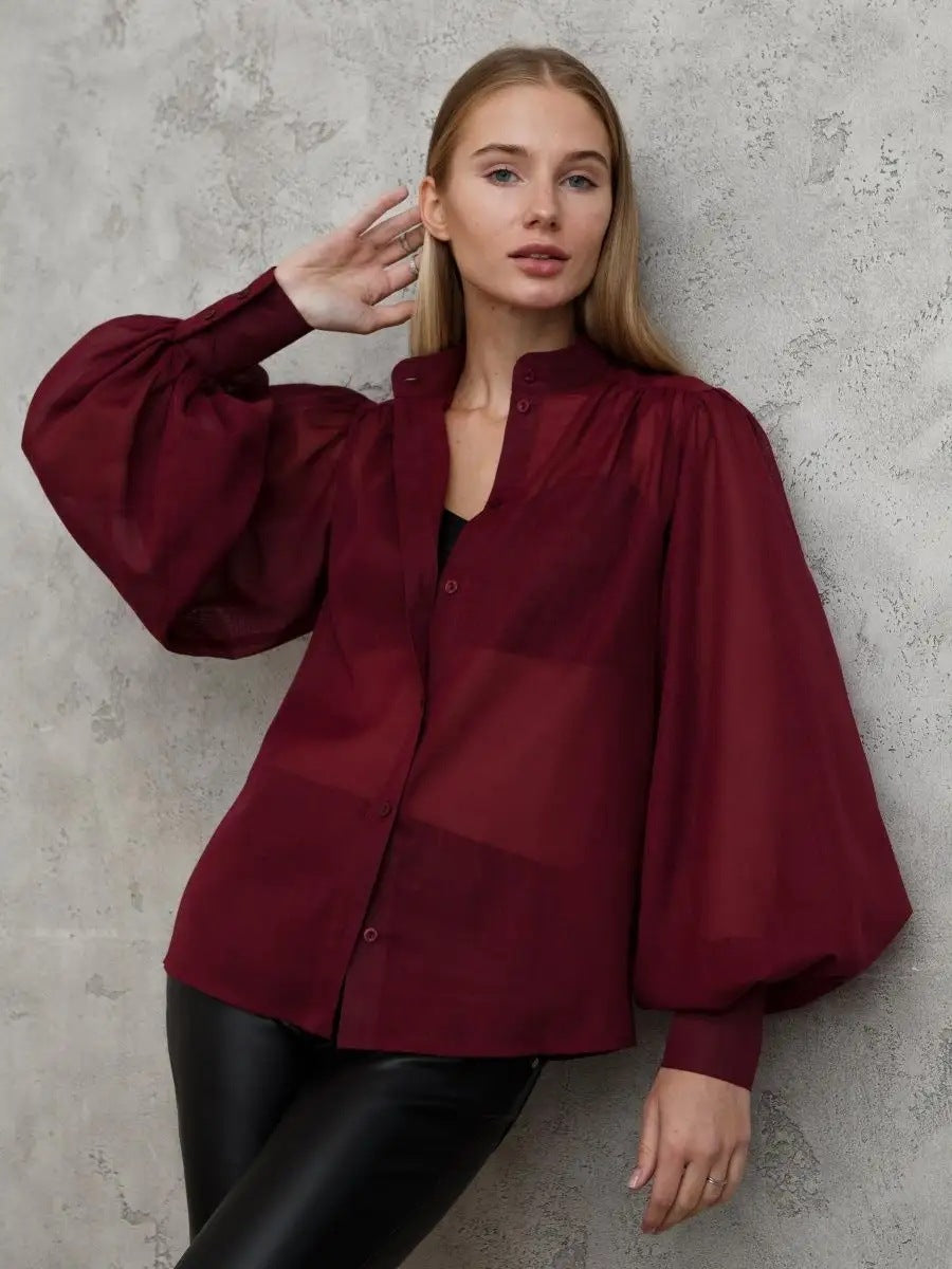 Elegante Damenbluse mit Puffärmeln und transparenten Stoff von berg-feldt
