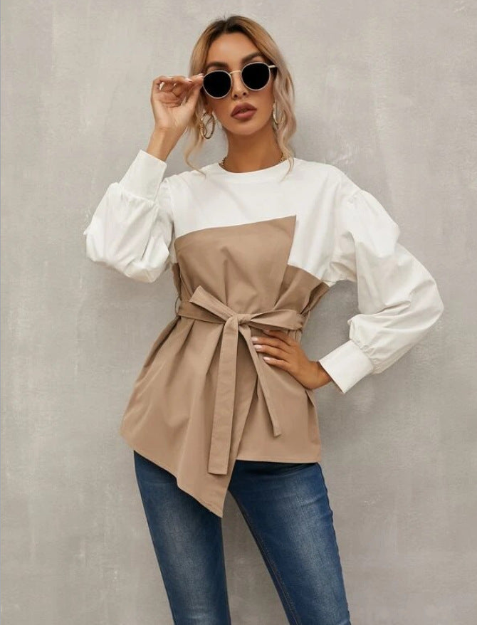 Elegante Damenbluse mit asymmetrischem Schnitt und modischem Gürtel von berg-feldt