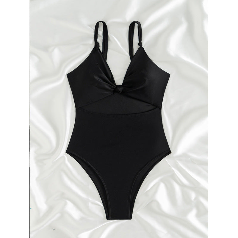 Maillot de bain femme berg-feldt, échancré avec nœud torsadé sur le devant