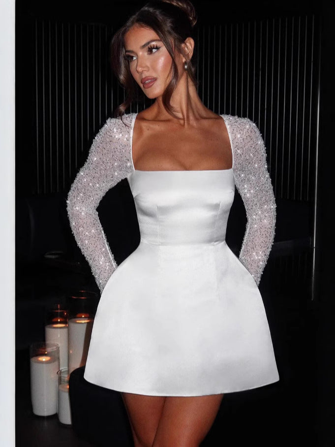 Mini-robe glamour pour femme avec manches transparentes à paillettes et jupe évasée Berg-Feldt
