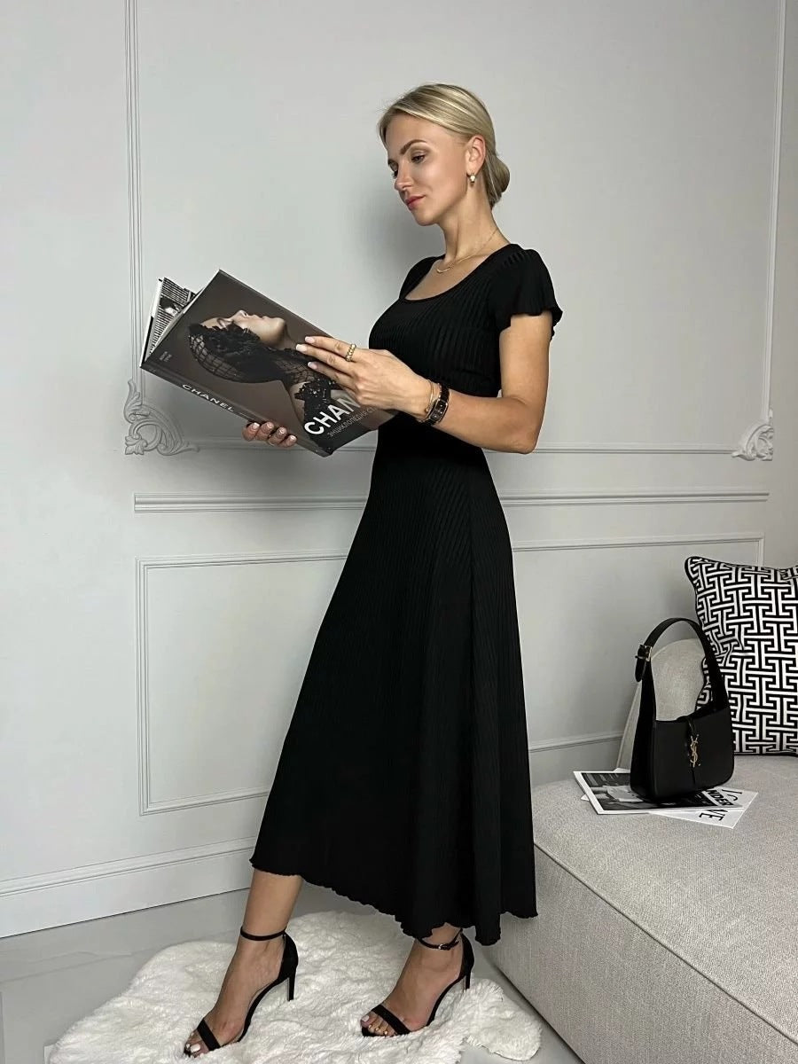 Robe midi élégante côtelée à manches bouffantes pour femme par berg-feldt