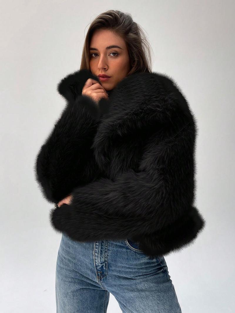 Veste courte en fausse fourrure tendance pour femme avec manches bouffantes Berg-Feldt