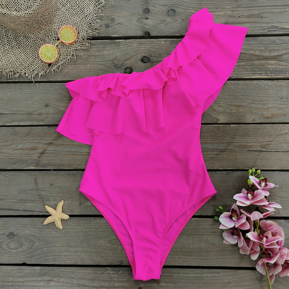 Maillot de bain femme Berg-Feldt : Volants volumineux et design asymétrique